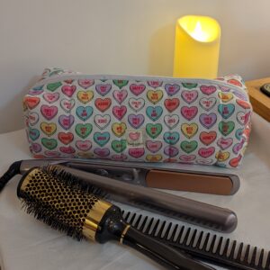 Hair Straightener, brush and comb pouch-carry anywhere or simply keep all together in this stylish Love Heart pouch with love heart zip charm.